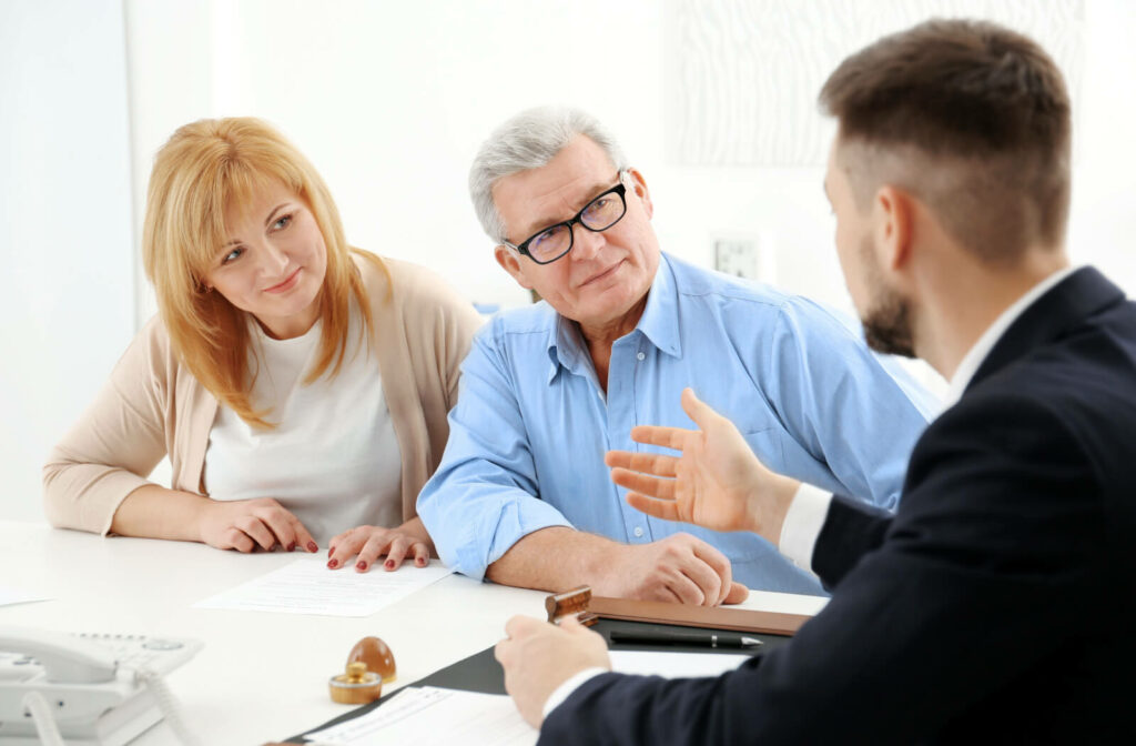 two seniors speak with a legal advisor
