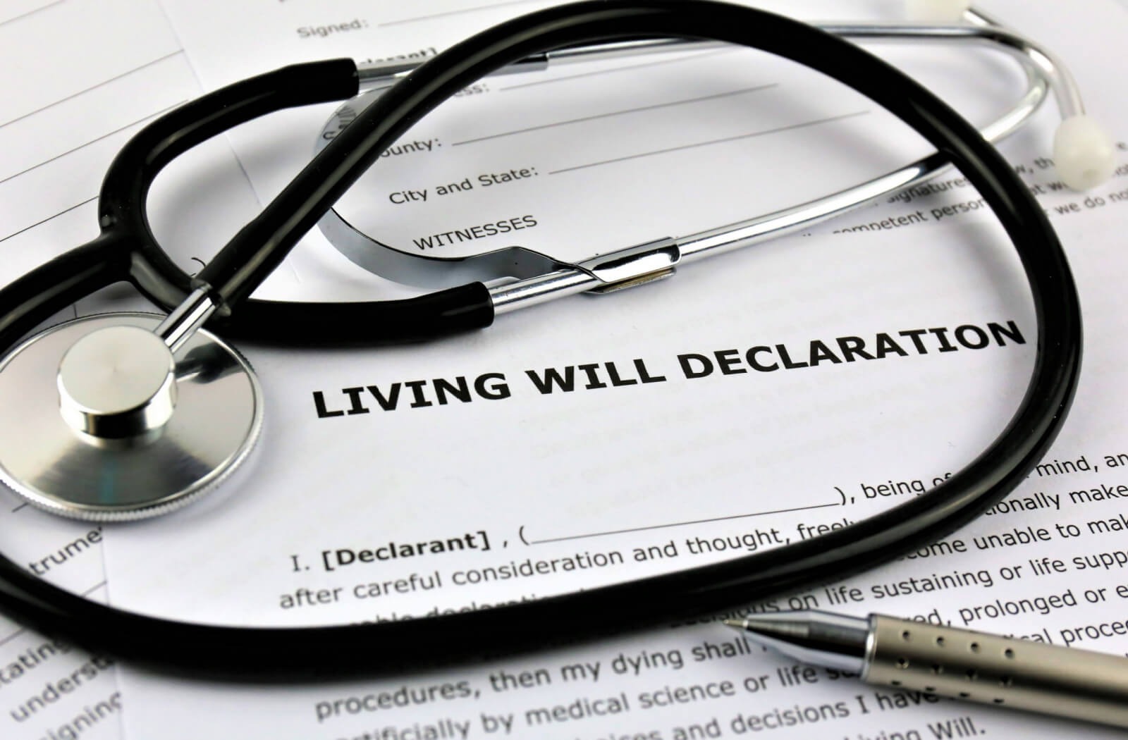 a living will declaration with a stethoscope resting on top
